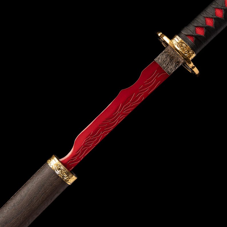 May include: A red and gold decorative sword with a black handle and a red blade. The blade has a unique wave-like design. The handle is wrapped in black material with red diamond-shaped accents. Gold accents are present on the sword.