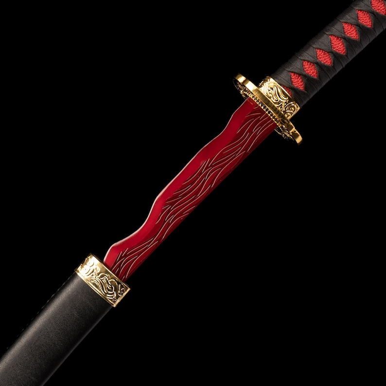 May include: A red and gold decorative sword with a black handle. The blade has a wavy design. The handle is wrapped in black material with red diamond-shaped accents. Gold accents are present on the hilt and scabbard.
