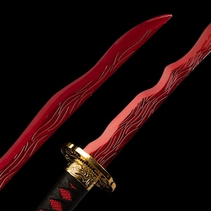 May include: Close-up of a red katana blade with a gold hilt and black handle. The blade has a wavy design etched into the red surface. The handle is wrapped in black and red material.