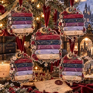 May include: A set of five hanging ornaments, each featuring a stack of five books titled A Court of Thorns and Roses, A Court of Mist and Fury, A Court of Wings and Ruin, A Court of Frost and Starlight, and A Court of Silver Flames with floral accents.