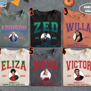 May include: Six t-shirts in various colors, each featuring a name in a collegiate font, a portrait, and the text "EST 2025" and "ZOMBIES 4: DAWN OF THE VAMPIRES". The names are Addison, Zed, Willa, Eliza, Nova, and Victor.
