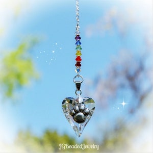 Rainbow Bridge Paw Heart Crystal Suncatcher. Rearview Mirror Car Charm or Window Decoration. Designed with the best of the best crystals, silver paw charm and made to last for many years.