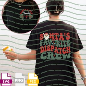 May include: Black t-shirt with the text "SANTA'S FAVORITE DISPATCH CREW" in red, green, and white. The design includes a Santa Claus graphic and a Christmas theme. The shirt also has a smaller design on the front.