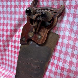 Vintage Hand Saw Owl Sculpture #1 with Caster Wheel Eyes