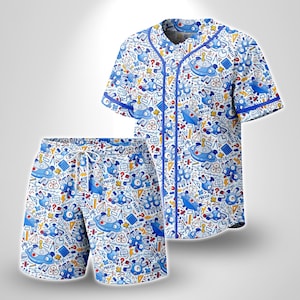 May include: A short-sleeved button-down baseball jersey and matching drawstring shorts set featuring an all-over print of blue cartoon robots, calculators, geometric shapes, and the word MATH in a repeating pattern on a white background.