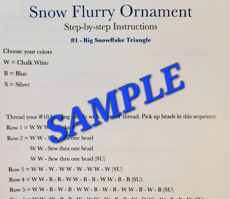 May include: A page from a craft instruction guide titled "Snow Flurry Ornament." The guide provides step-by-step instructions for creating a snowflake triangle, with color choices and bead sequences. A blue "SAMPLE" watermark is across the page.