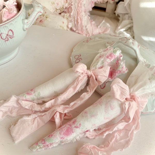 tattered washed cotton fabric carrots shabby faded pink roses on white with pink crinkled bows
