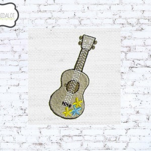 Ukulele machine embroidery design. Fun little guitar perfect for luau embroidery projects. Tropical embroidery with a summer feel.
