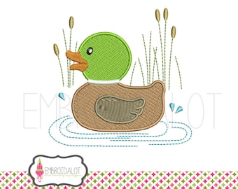 May include: Embroidered design of a green duck with brown feathers swimming in blue water with green reeds in the background.