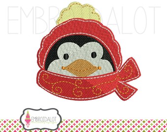 Penguin machine embroidery design. Christmas embroidery with a touch of whimsy. Cute penguin embroidery for a bit of fun.