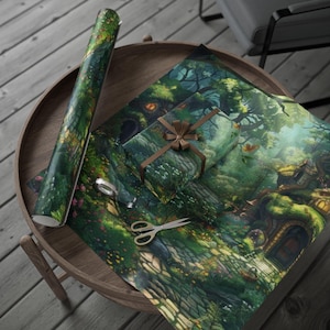 May include: A roll of gift wrap and a wrapped present featuring a detailed fantasy forest scene with houses, trees, and flowers. A pair of scissors and tape are on the wooden table. The gift is tied with a brown ribbon.