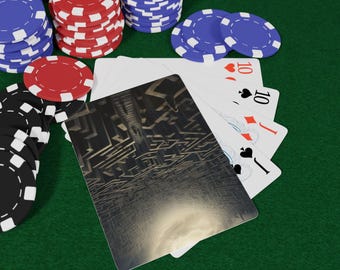May include: A collection of poker chips in red, blue, and black, along with playing cards. The cards show the number 10 and various suits. The background is a green felt surface, creating a classic casino game scene.