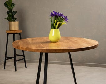 BRAVION Round oak table Omega with flora legs