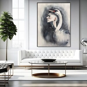 May include: A large rectangular wall art piece featuring a surreal watercolor painting of a person's profile merged with the long neck and head of a white swan. The artwork uses a monochromatic palette of charcoal gray, black, and white tones.