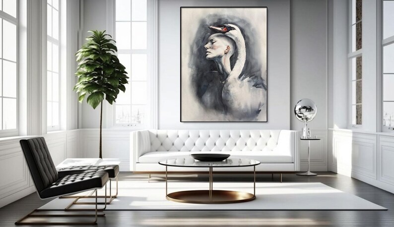 May include: A large rectangular wall art piece featuring a surreal watercolor painting of a person's profile merged with the long neck and head of a white swan. The artwork uses a monochromatic palette of charcoal gray, black, and white tones.