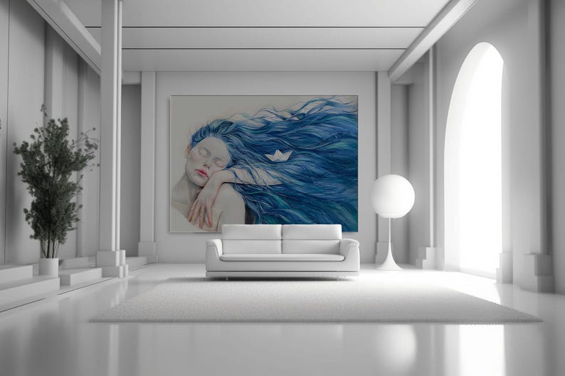 May include: A large rectangular wall art print featuring a painting of a person with long, flowing blue hair and closed eyes, resting their head on their arms. A small white paper boat is nestled within the strands of the vibrant blue hair.