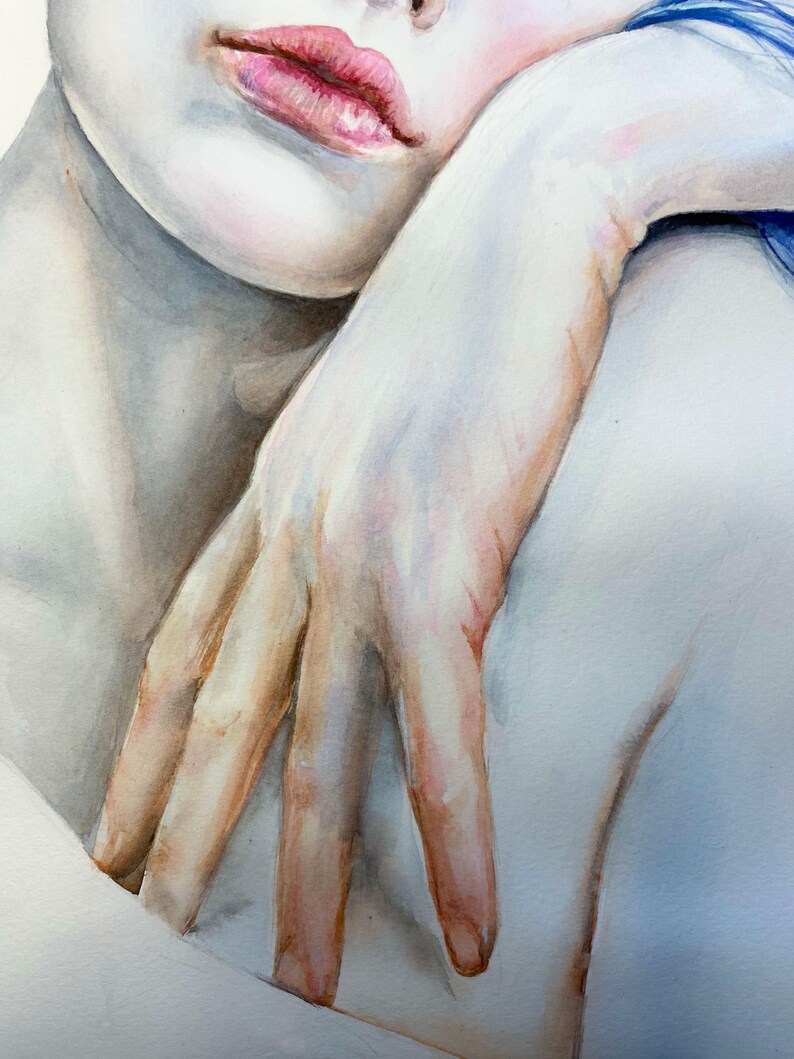 May include: A watercolor painting depicting a close-up of a face and a hand resting near the chin. The artwork features soft skin tones with pinkish highlights on the lips and fingers, contrasted by a vibrant blue element at the top right corner.