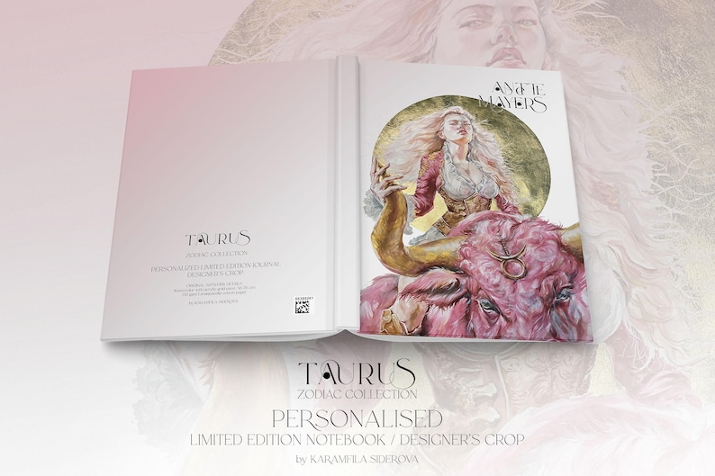 May include: A hardcover journal featuring a Taurus zodiac theme. The cover displays a pink bull and a woman with long hair against a gold circle. Text includes Taurus Zodiac Collection, Personalized Limited Edition Notebook, and Designer's Crop.
