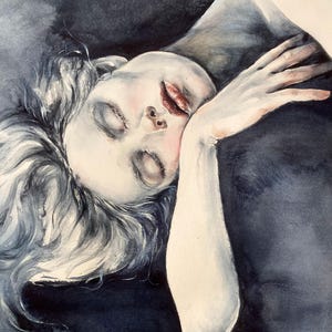 May include: A watercolor painting depicting a person with closed eyes and flowing hair, resting their head against a dark, shadowy form. The color palette features deep indigo, charcoal, and black tones contrasted with pale skin and red lips.