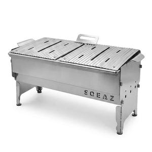 May include: A stainless steel barbecue grill with a ridged lid and a handle. The grill has four legs and the word "SQEAZ" is printed on the side. The grill is designed for outdoor cooking.