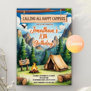 May include: A camping-themed birthday invitation with a cartoon illustration of a mountain landscape, a tent, a campfire, and a sign that says "Jonathan Camp". The text on the invitation reads "Calling all happy campers, Join us we celebrate Jonathan's 10th Birthday!"  The invitation also includes the date, time, location, and RSVP information.