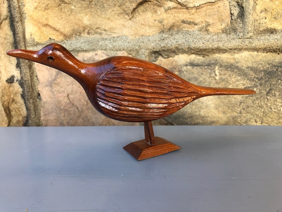 A Carved and Painted Wood Shore Bird with Nail Beak A Carved and Painted Wood Shore Bird with Nail Beak