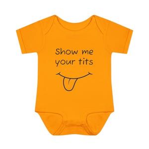 Cache-couche pour bébé, montre-moi tes seins