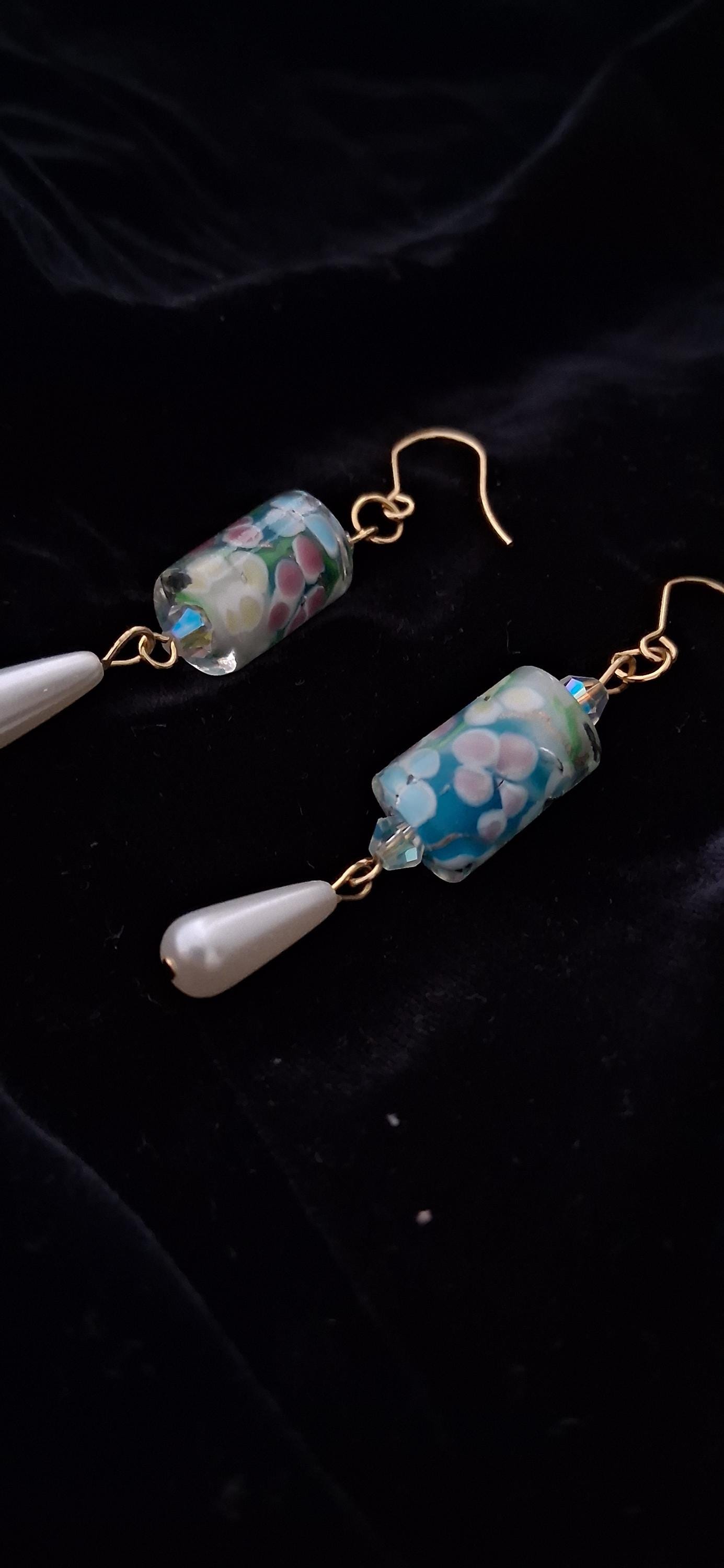 Paire de boucles d'oreilles or rosé, modèle boules, vers 1900, Art