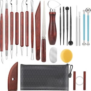 May include: A comprehensive pottery and sculpting tool set. The set includes various tools with wooden handles, metal blades, and sculpting tips. Also included are a sponge, a metal scraper, and a black zippered case for storage.