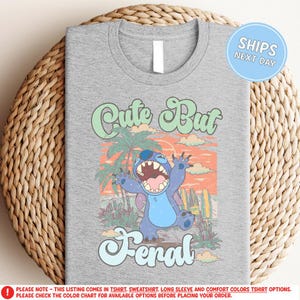 a gray shirt with a cartoon character on it