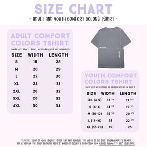 The image is a size chart for an adult and youth comfort colors t-shirt. It provides measurements for different age groups, including sizes S, M, L, XL, 2XL, 3XL, and 4XL. The chart also includes a size chart for youth comfort colors t-shirt, which is designed for younger individuals. The chart provides guidelines for measuring the width of the shirt from the highest point of shoulder to the bottom of the shirt, allowing for a proper fit.