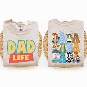 a couple of shirts that are on a rope