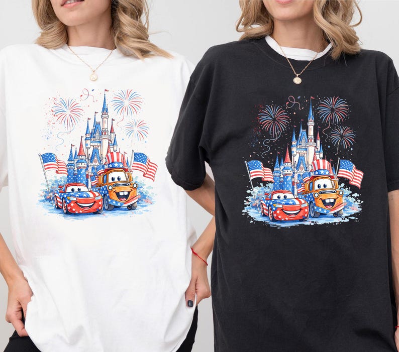 two people wearing t-shirts with a graphic design depicting a castle, fireworks, and two cartoon cars.
