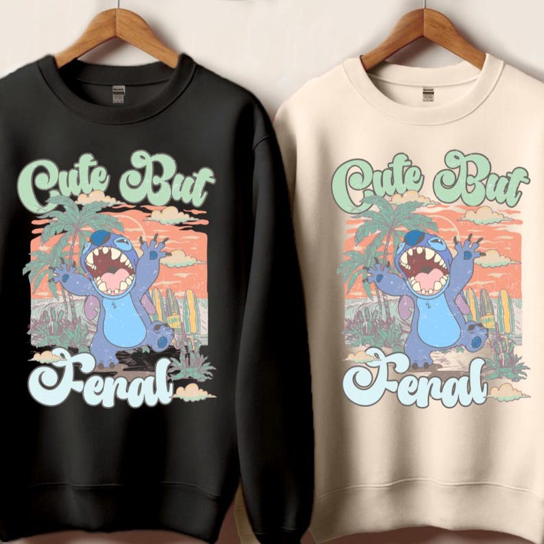 a couple of sweatshirts hanging on a wall