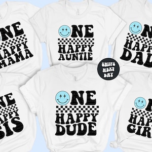 a group of tshirts that say one happy birthday