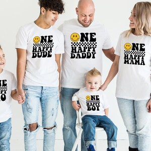 a family of four wearing matching tshirts