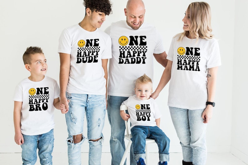 a family of four wearing matching tshirts
