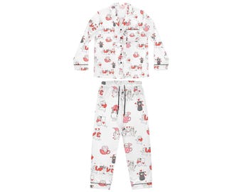 May include: White pyjamas with a long-sleeved shirt and trousers. The shirt and trousers have a print of cats and hearts with the word "LOVE" repeated throughout.