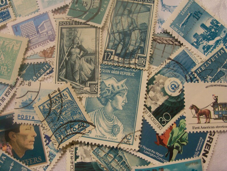 May include: A collection of vintage postage stamps in various sizes and shapes, featuring diverse designs and colors. Stamps depict historical figures, buildings, and scenes, with text in multiple languages. The stamps are primarily shades of blue, green, and brown.