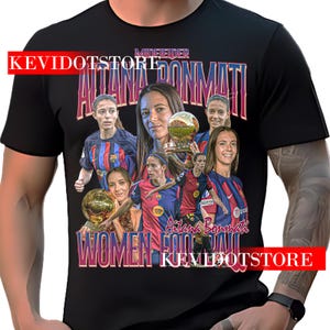 May include: Black t-shirt featuring a collage of images of a female soccer player, with the text "MIDFIELDER ALTANA BONMATI WOMEN FOOTBALL" in a vintage style. The shirt also has the text "KEVIDOTSTORE" in red.