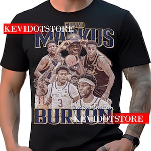 May include: Black t-shirt with a graphic of basketball players, including Markus Burton, wearing Notre Dame uniforms. The text "GUARD MARKUS BURTON" is printed in gold and blue on the shirt.
