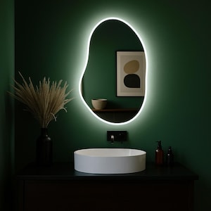 Modern LED Backlit Bathroom Mirror, Asymmetrical Irregular Wall Mounted Vanity Mirror with Soft Ambient Lighting for Contemporary Decor