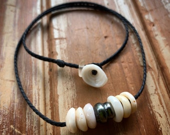 Tahitian pearl necklace with puka shells and a locking seaglass clasp