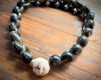 Speckled Kupe'e necklace with puka and cowrie lip clasp 22 inch