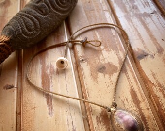 Purple cowrie shell necklace with locking seaglass clasp