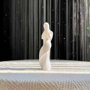 Back view of the Soulmates Lovers Sculpture, emphasizing the minimalist, abstract forms of the couple in a loving embrace. 15cm tall white decorative statue.