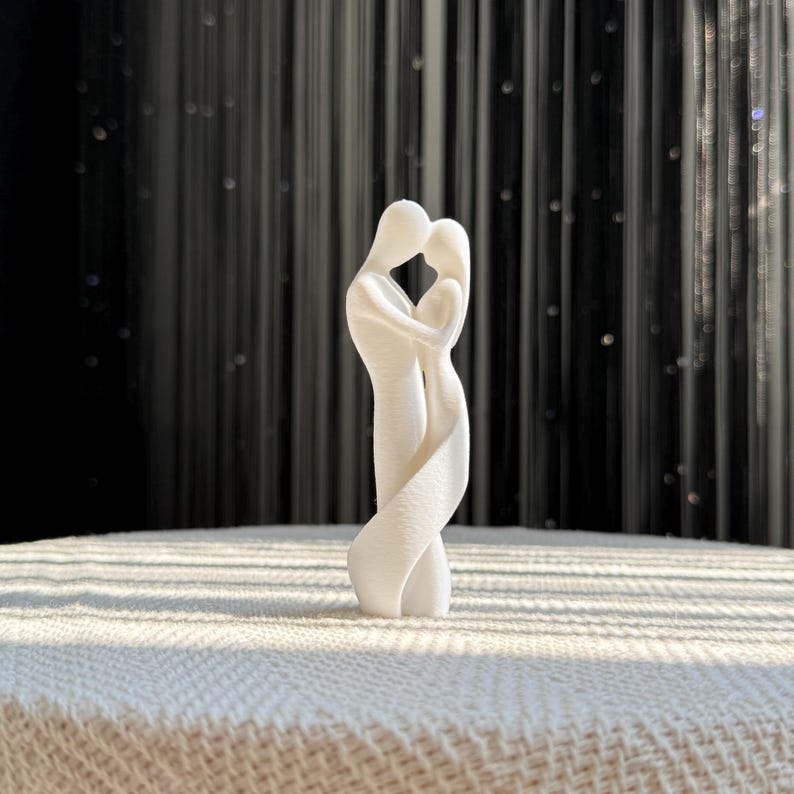 Soulmates Lovers Sculpture from the front, featuring a delicate and abstract representation of a couple holding each other. Ideal for anniversary or wedding gift.