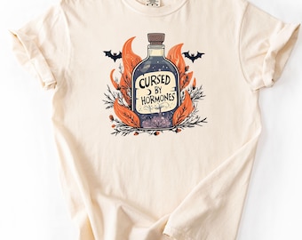 Funny Menopause Shirt, Cursed By Hormones Tee, Perimenopause Gift for her, Hot Flash Humor Halloween Comfort Colors Shirt