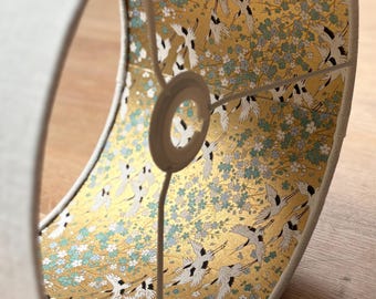 Luxury lampshade using beautiful Japanese Chiyogami (Yuzen) paper; cream/white linen exterior; gold, blue, white interior, featuring cranes
