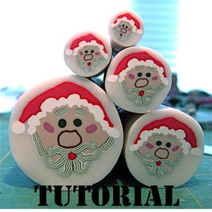 May include: A stack of five white clay ornaments shaped like Santa Claus heads. Each ornament has a red hat, white beard, and black eyes. The ornaments are arranged in a pyramid shape, with the largest ornament at the bottom and the smallest ornament at the top. The word "TUTORIAL" is printed in black letters at the bottom of the image.